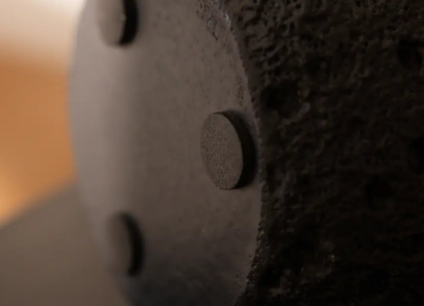 Non-slip base detail of Capri black concrete candle