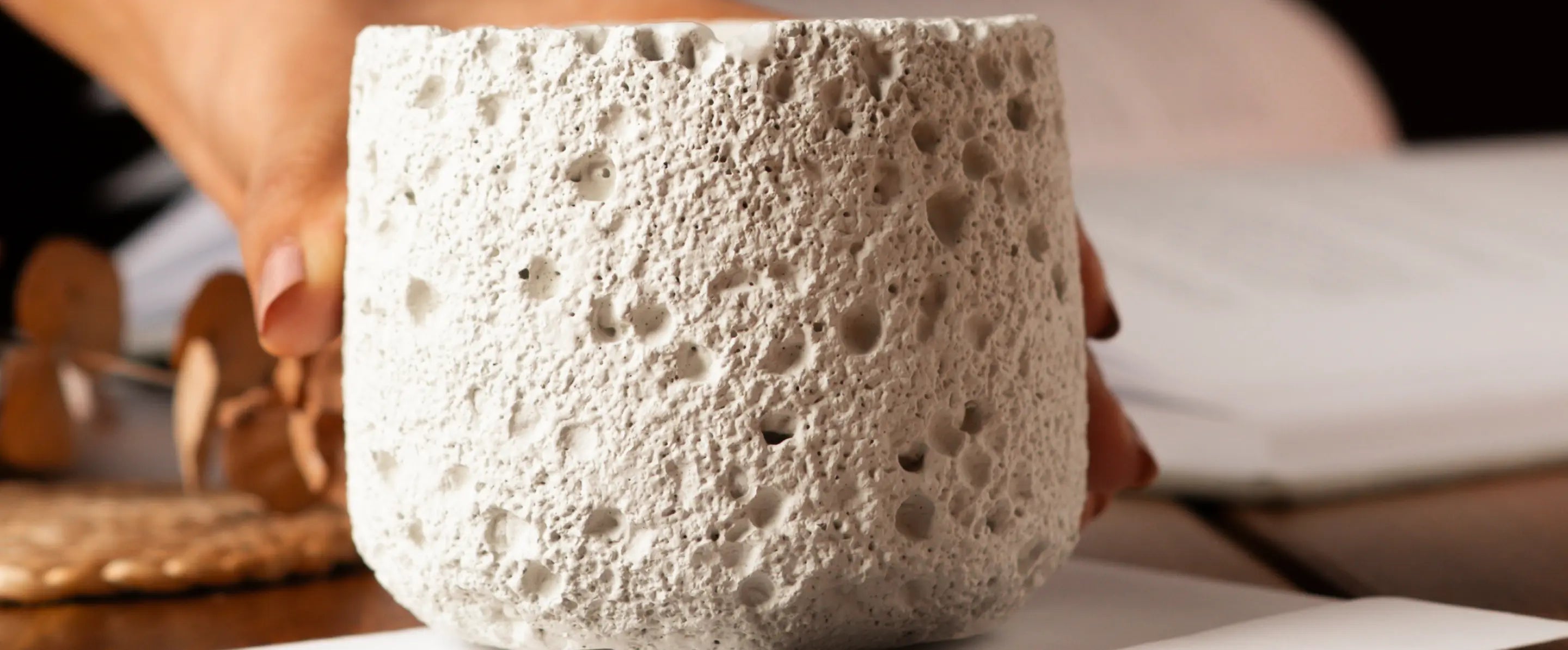 Textured white Capri candle adds earthy charm to home decor setup