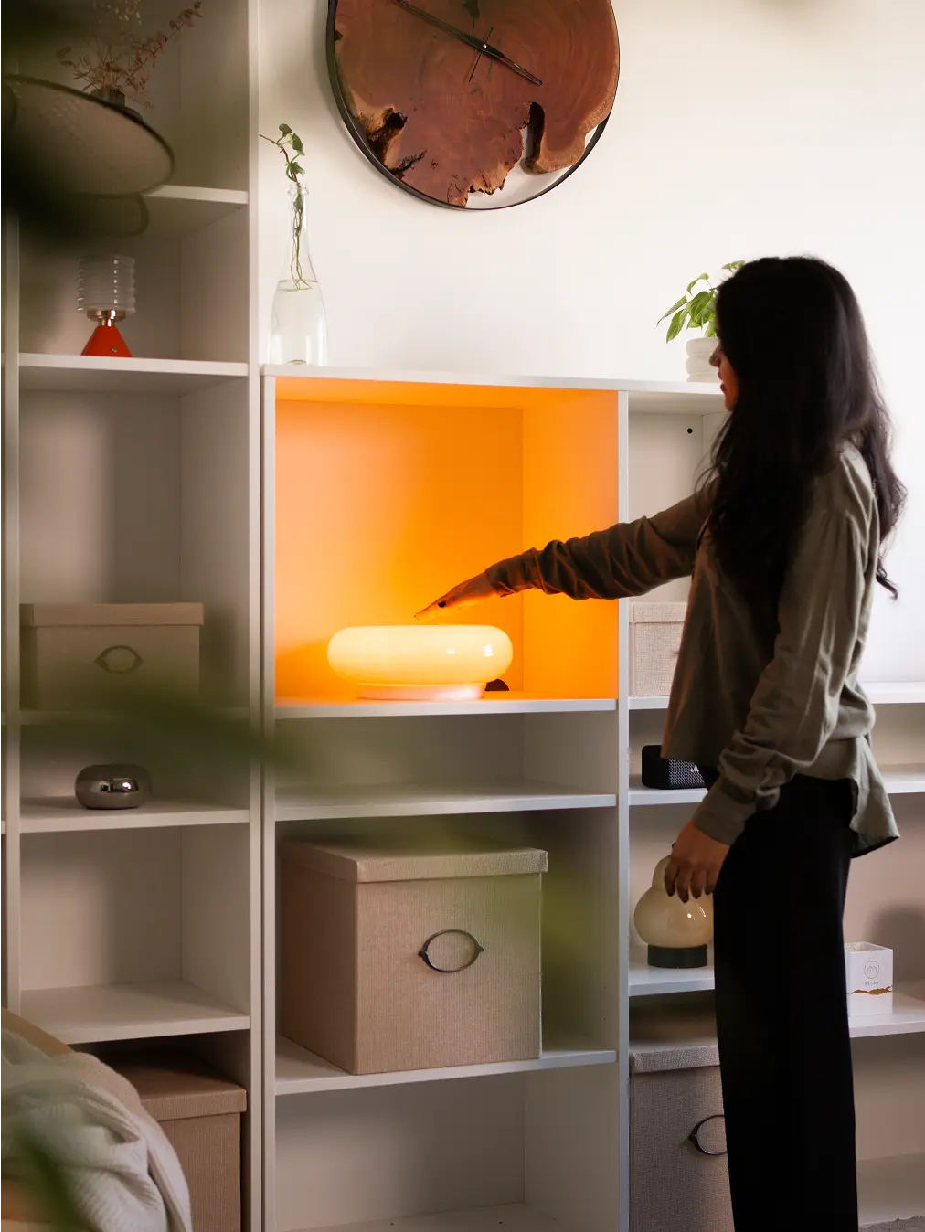 Donut Glass Lamp with vibrant orange glass body, featuring a tri-color LED light and touch-sensitive chrome control.