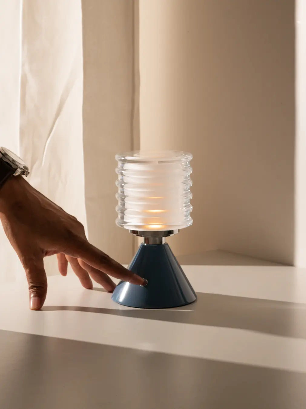 Dusk Table Lamp with touch-sensitive aluminum base, ribbed glass, and dimmable LED light