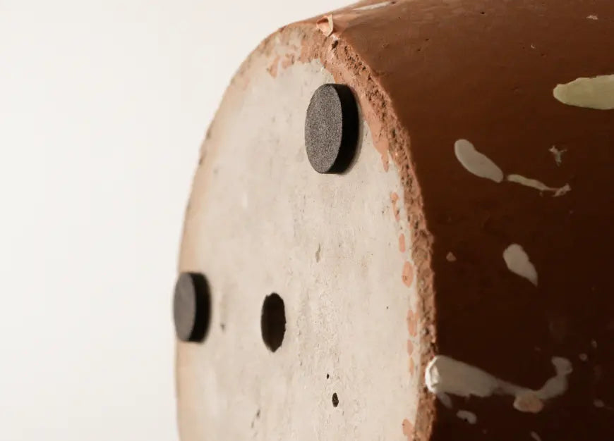 Close-up of the Marvellous Concrete Planter - Brown, showcasing its speckled terrazzo texture and handcrafted details.