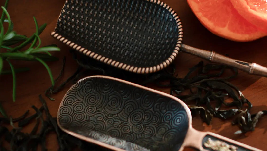 Top view of two Vintage Spoons, showcasing their textured and patterned scoops.