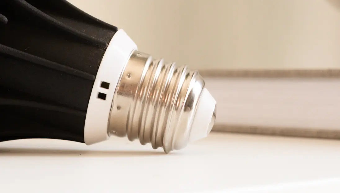 Side close-up of Blaze 12W LED Grow Light - black base with silver E27 fitting.