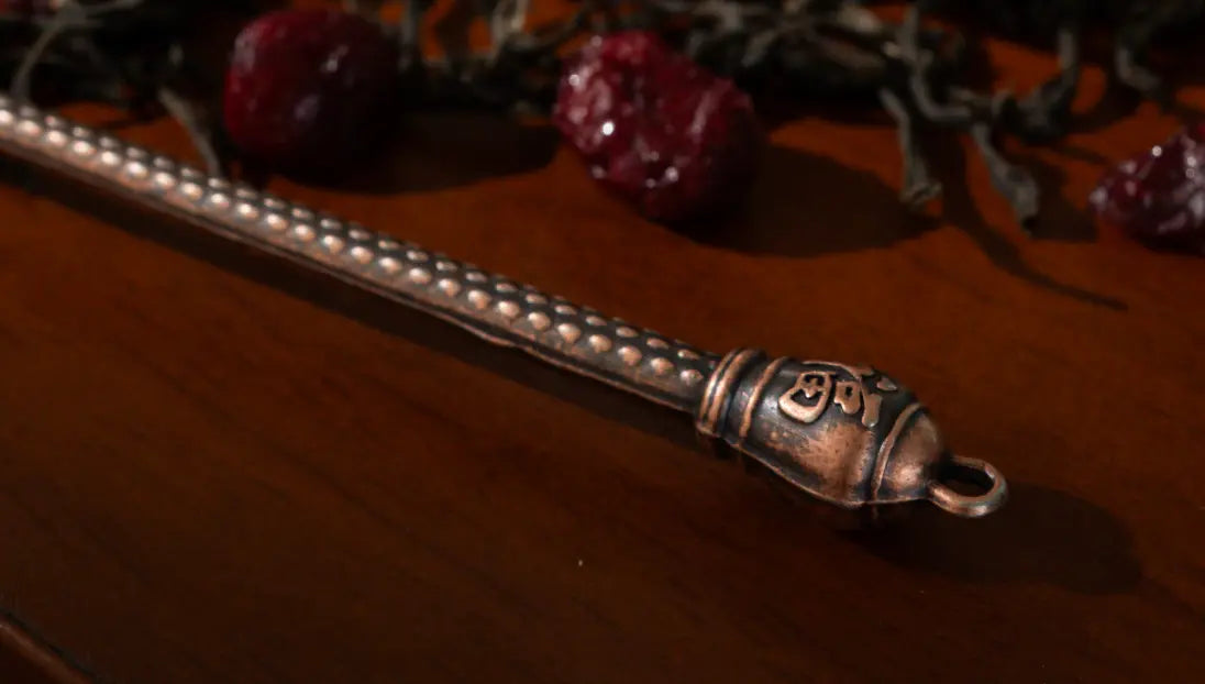 Detailed handle of a Vintage Spoon, featuring an engraved design.
