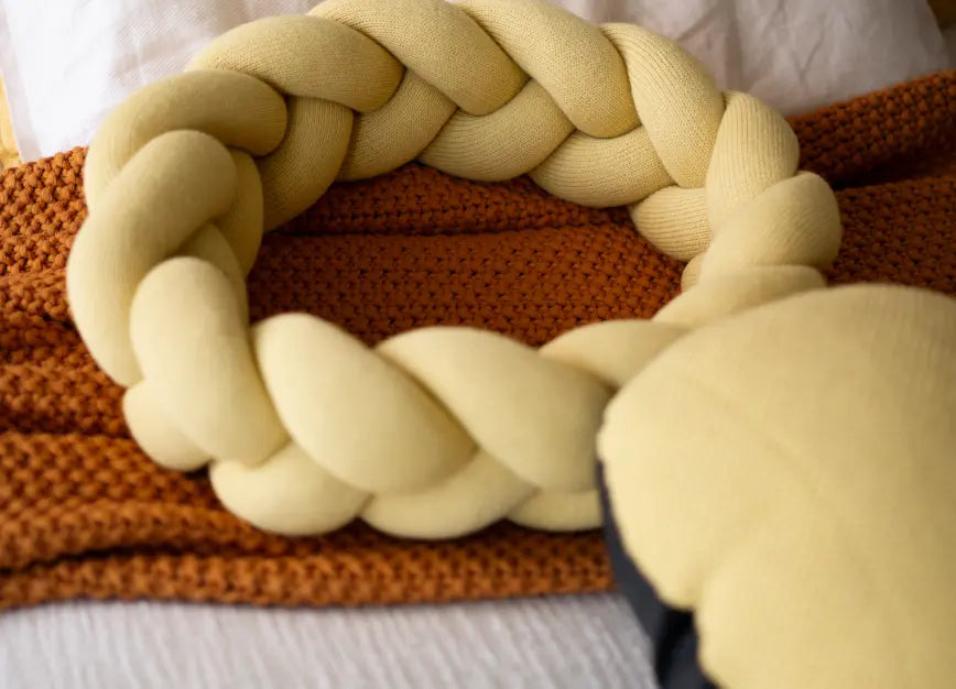 Braided ring separated from Gharko round cushion showing modular design feature