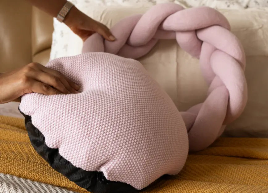 Removable pink cushion cover with black base from Gharko Halo Nest