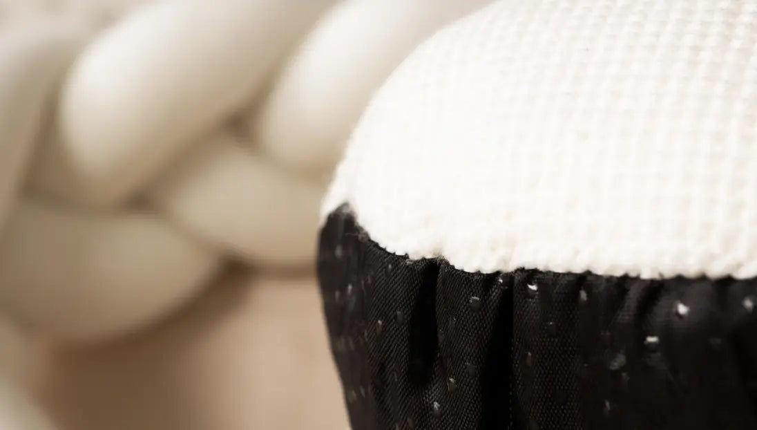 Anti-slip dotted base of Halo Nest Cushion in white