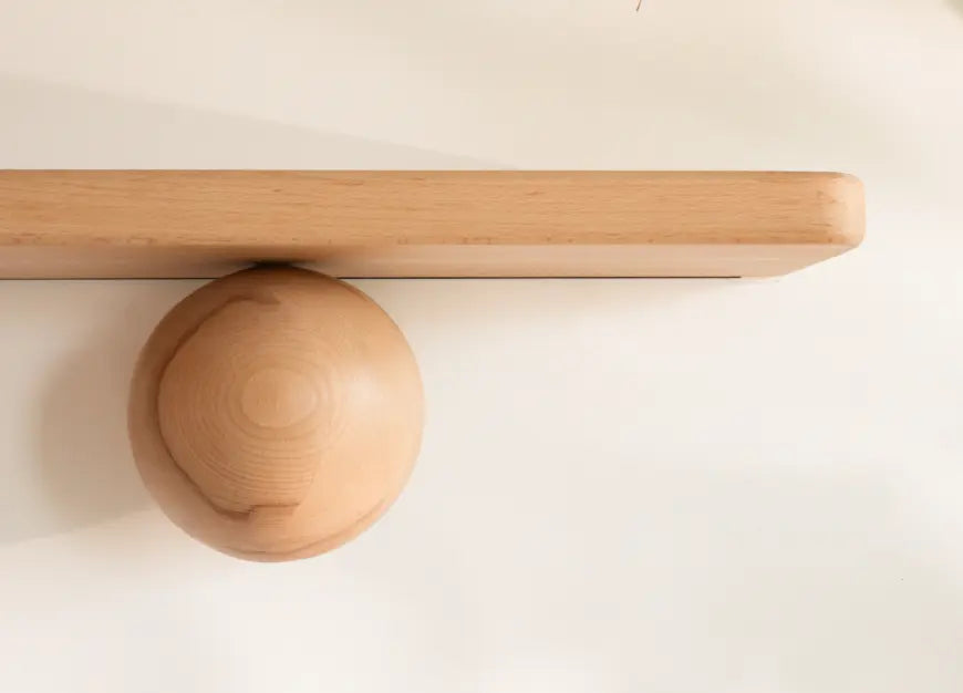 Close-up of Orb Wooden Floating Wall Shelf with natural matte finish