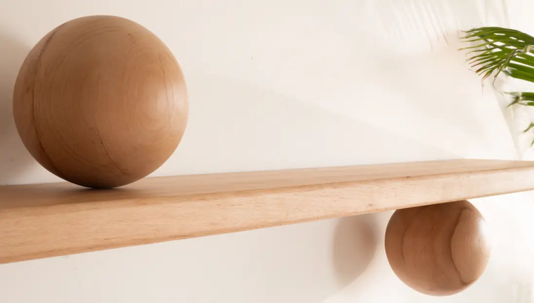 Side angle of Orb Wooden Floating Wall Shelf highlighting wooden texture