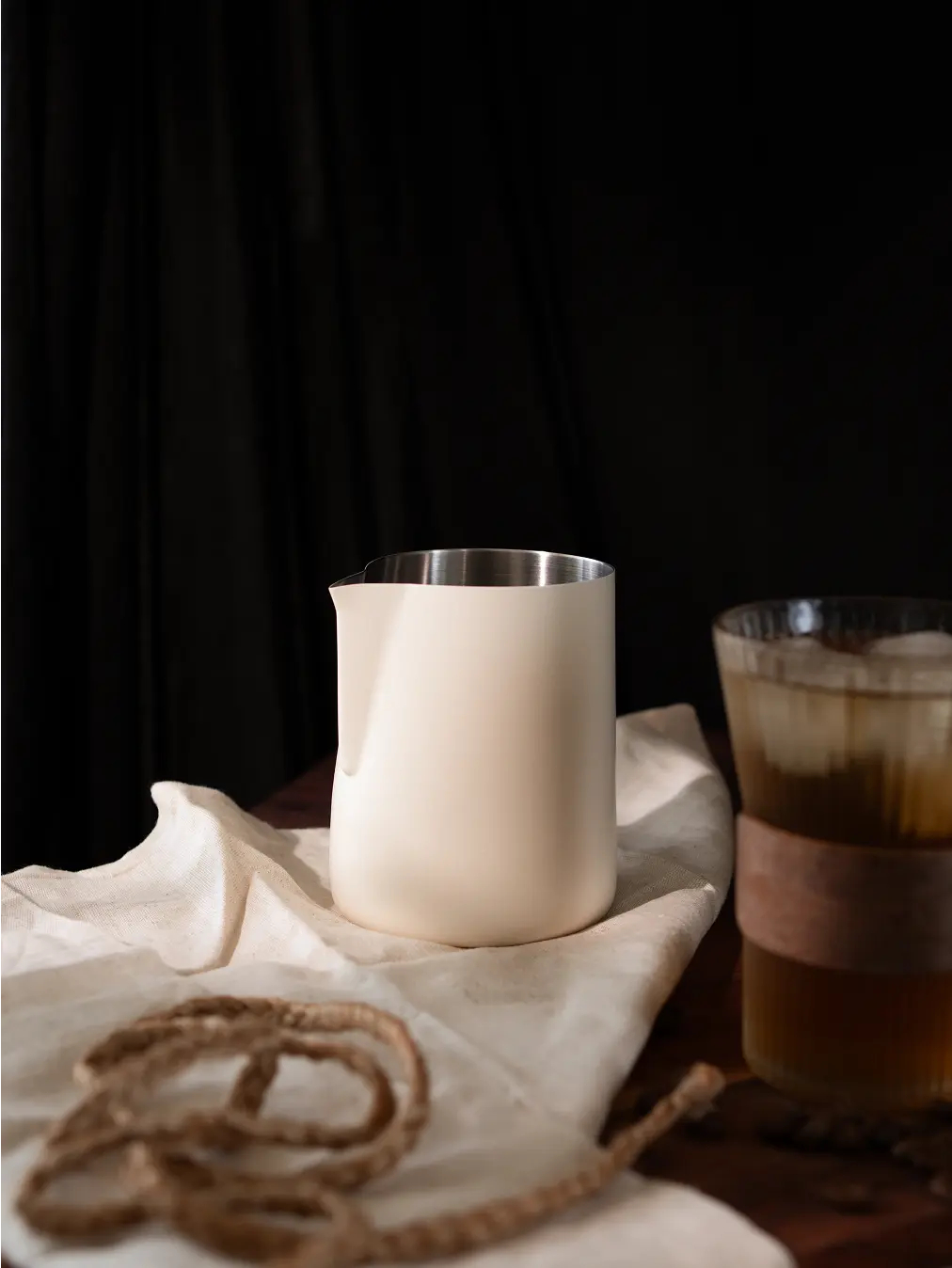 Matte white Brista Milk Pitcher with a seamless stainless steel interior and precision spout.