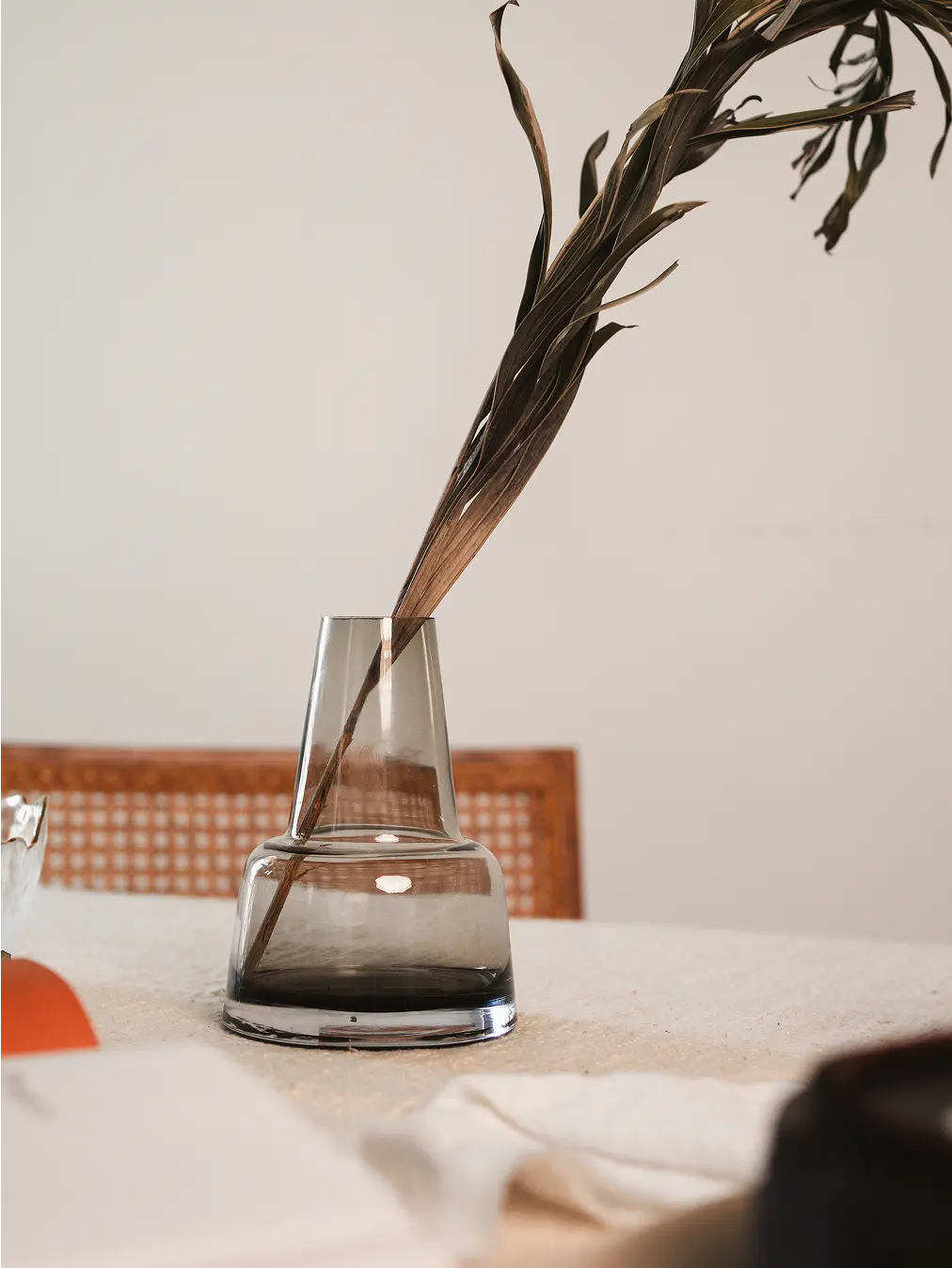 Tapered Pitcher glass vase in translucent black, featuring a sturdy base and modern design for home decor.