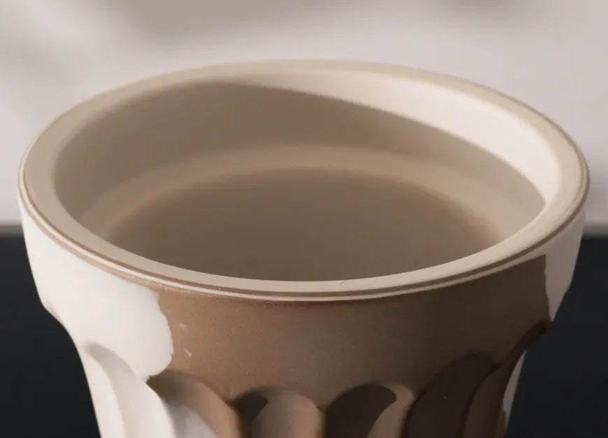 Close-up of Raya Ceramic Planter showing dual-tone glazed ceramic interior.