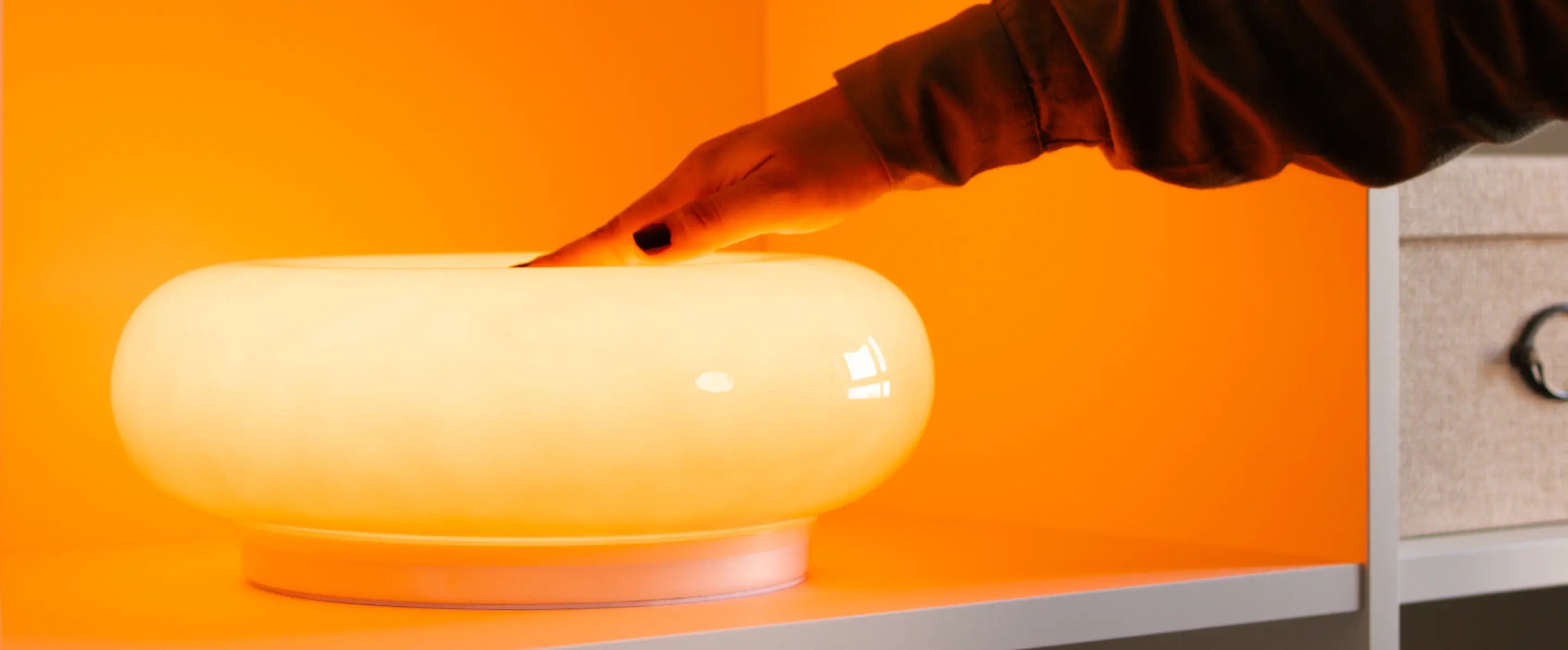 Donut Glass Lamp with a warm LED glow, touch-sensitive control, and a modern minimalist design.