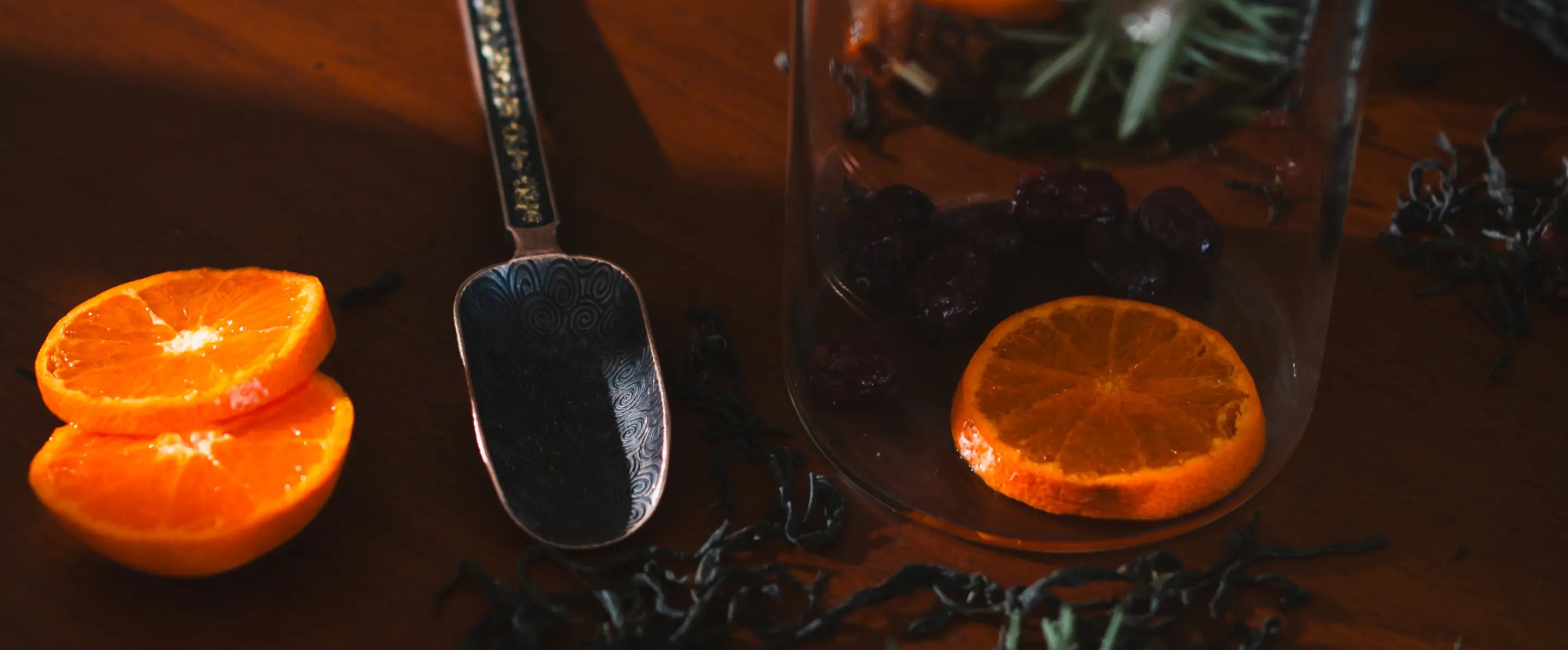 Vintage Spoon with Engraved Handle placed on a wooden surface enhancing its antique aesthetic.