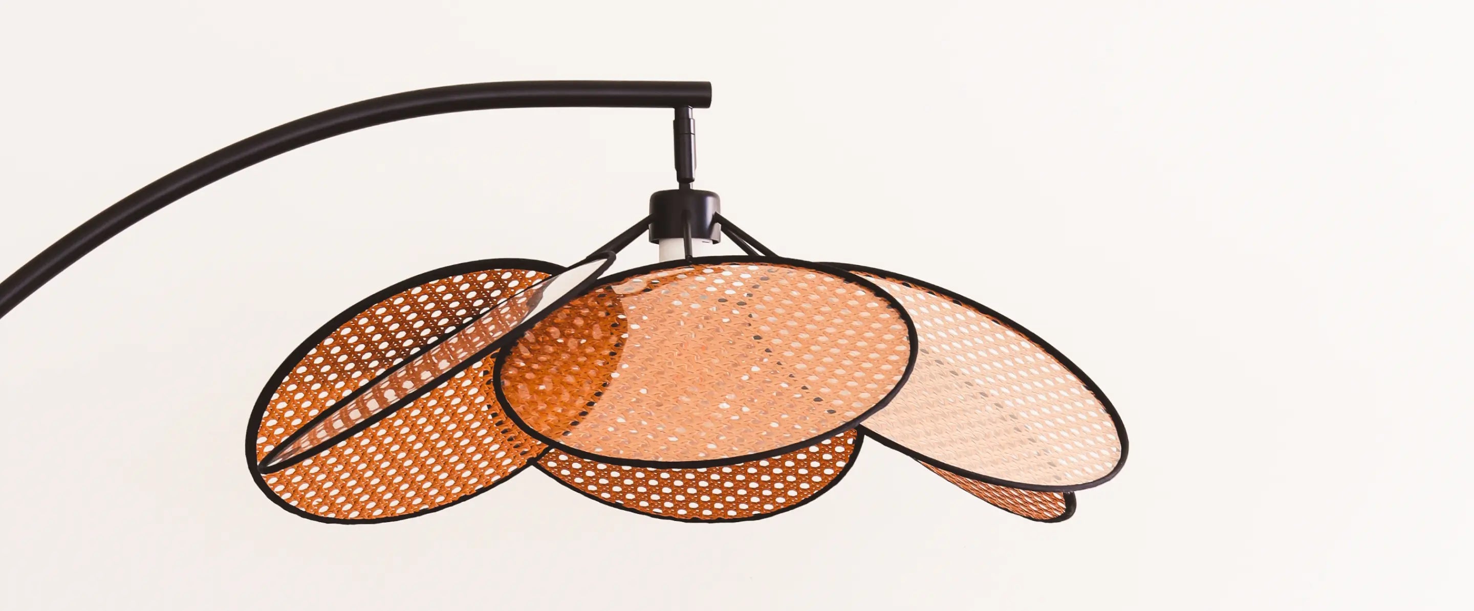 Detailed view of Hanai Floor Lamp’s rattan panels, showcasing craftsmanship and natural texture.