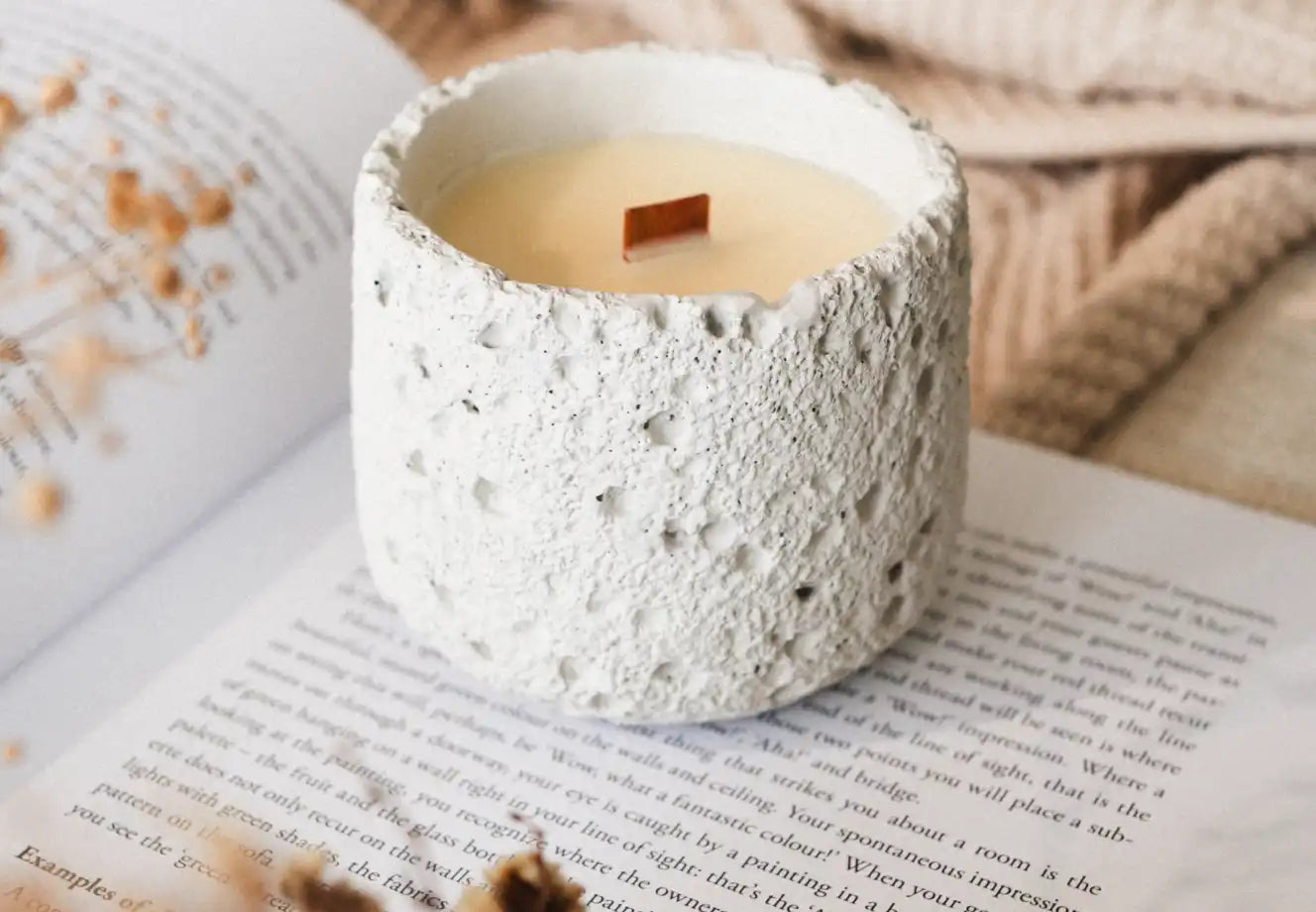 White concrete soy wax scented candle with wooden wick for cozy home decor