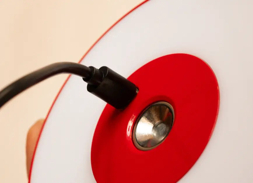 Type C cable charging the magnetic LED head of Gharko 3-in-1 rechargeable wireless lamp.