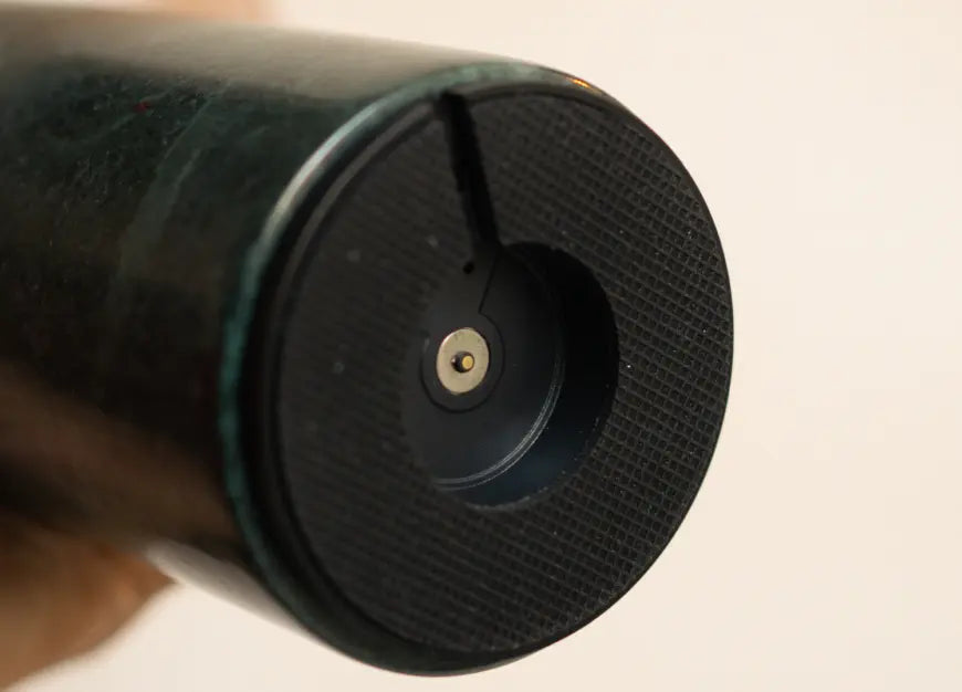 Close-up of Alba Moss Marble Table Lamp magnetic charging port at the base