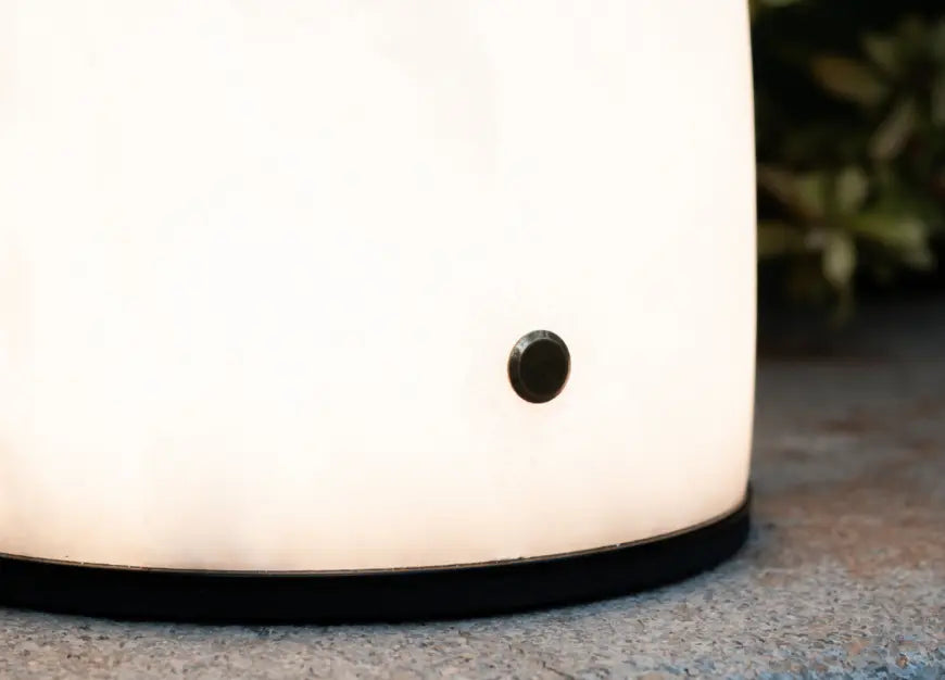 Touch control detail on Arcus marble lamp for easy brightness adjustment