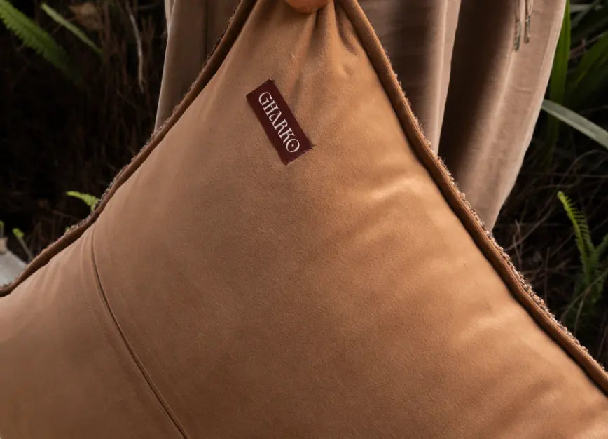 Back view of boucle cushion cover with concealed zip and soft polyester backing