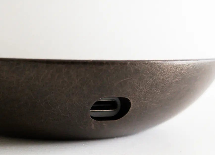 Type-C charging port on the textured metal base of Bud Marble Portable Table Lamp