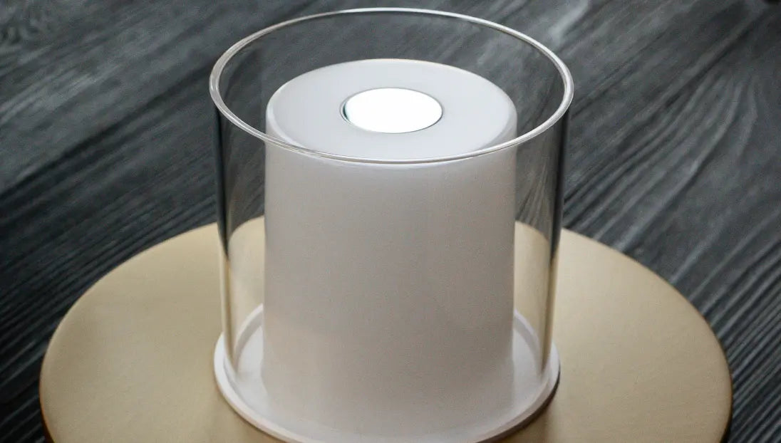 Modern cordless table lamp with PMMA shade and minimal design aesthetic