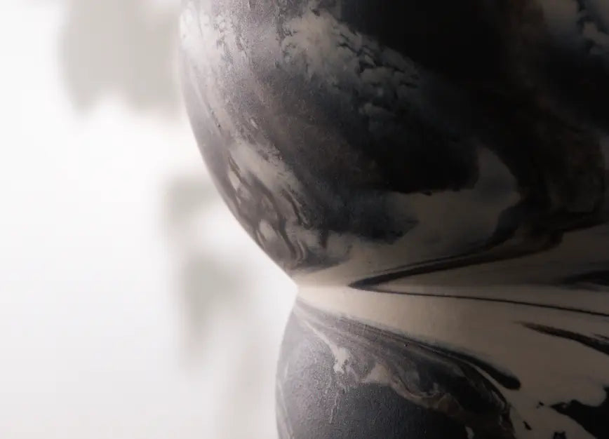 Close-up of black and white ceramic pot's texture detail