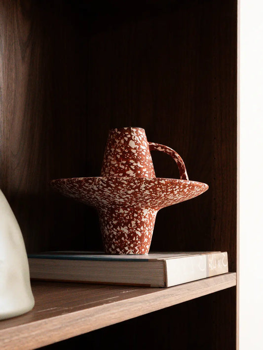Ferro Base ceramic vase with mottled texture styled on wooden shelf