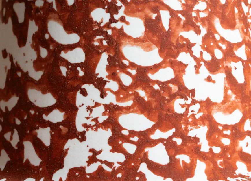 Organic mottled texture detail on bohemian ceramic vase surface