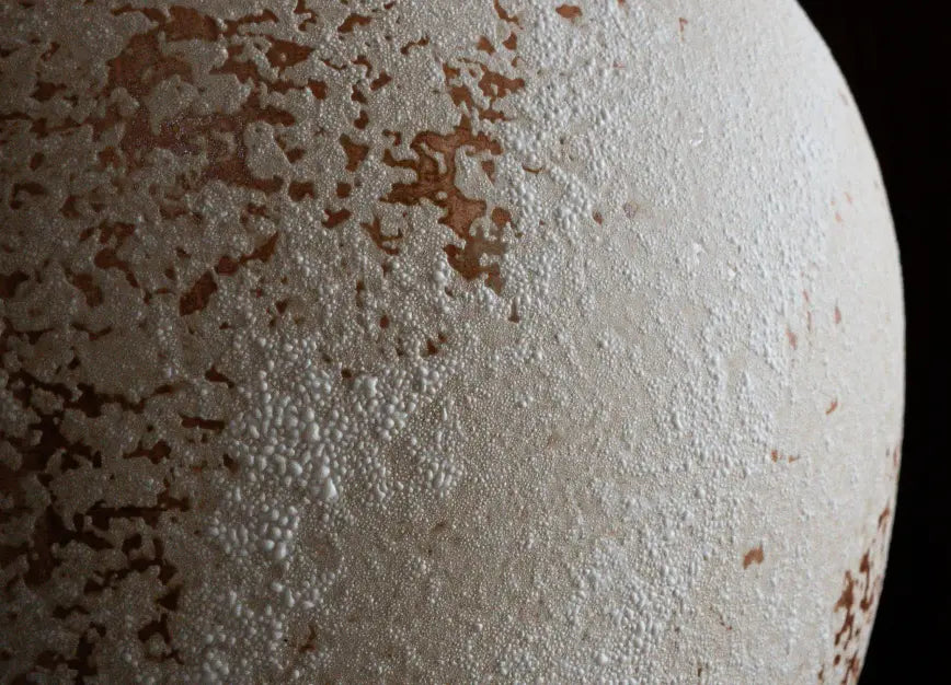 Close-up of Gaia ceramic vase showing natural speckled, textured surface