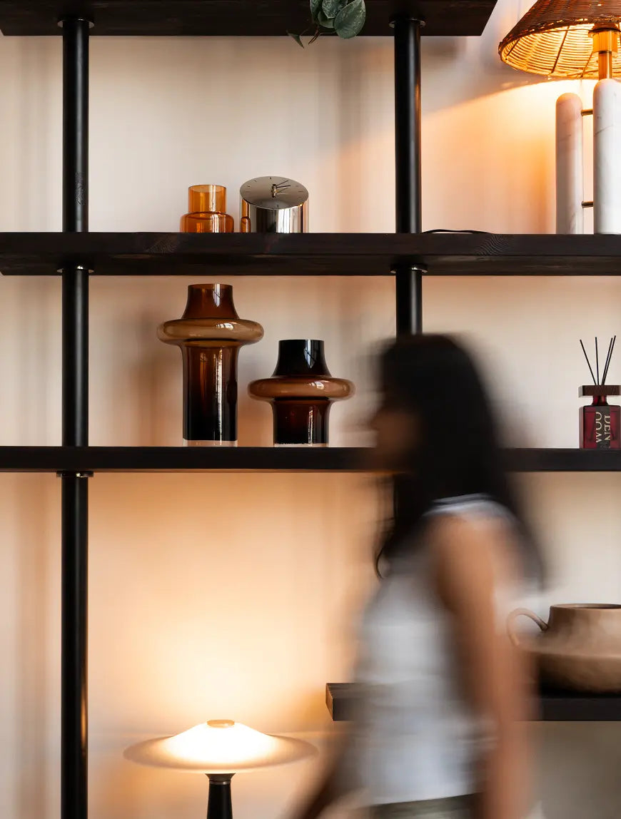 Halo Amber Glass Vase - Large styled on shelf with smaller amber vase, warm lamp and deco