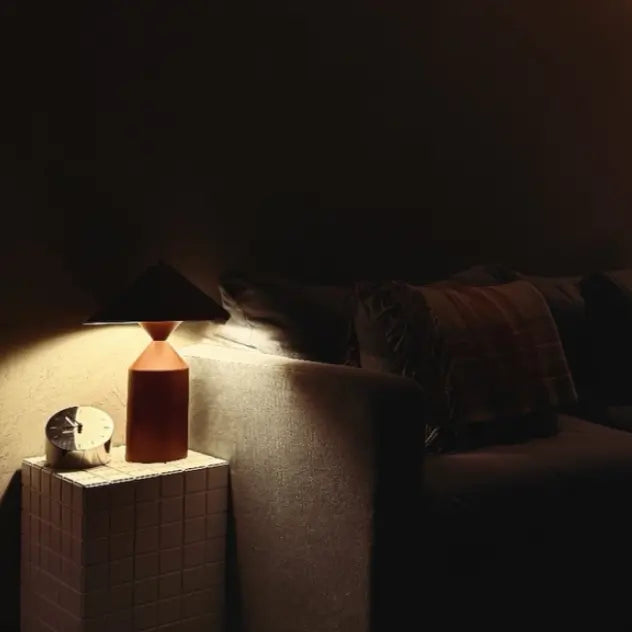 Desk clock on the sofa side table