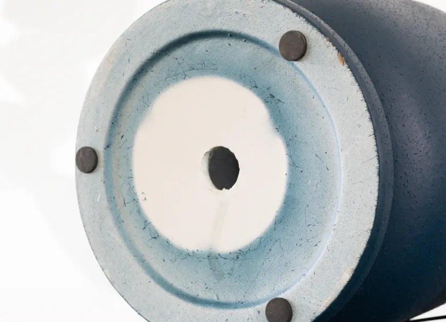 Jojo Ceramic Planter’s drainage hole with rubber stoppers, ensuring stability and proper water flow.