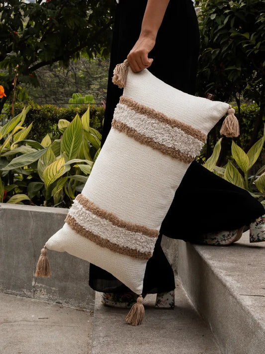 Kanso cushion cover with textured stripes and tassels styled as a modern rectangular cushion