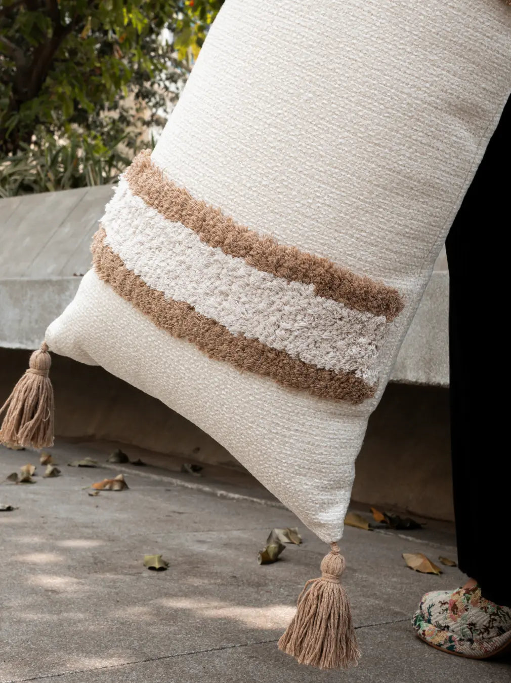 Close-up of Kanso cushion cover showing raised woven stripes and soft textured fabric