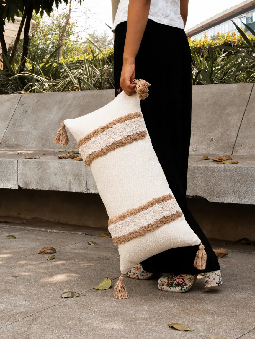 Kanso cushion cover with textured stripes and tassels styled as a rectangular lumbar cushion