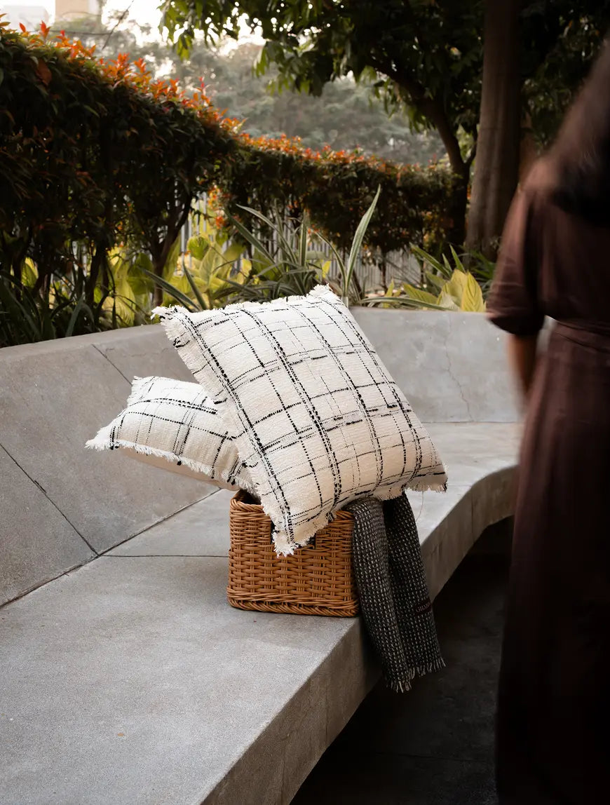 Lattice Cushion Cover styled on outdoor seating with calm, modern decor appeal.