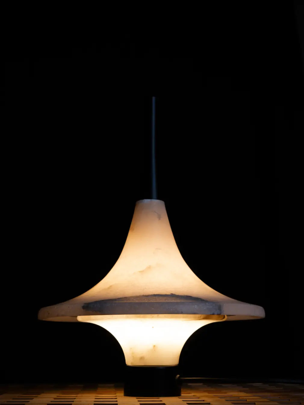 Premium Lattu Marble Table Lamp glowing in dark setting