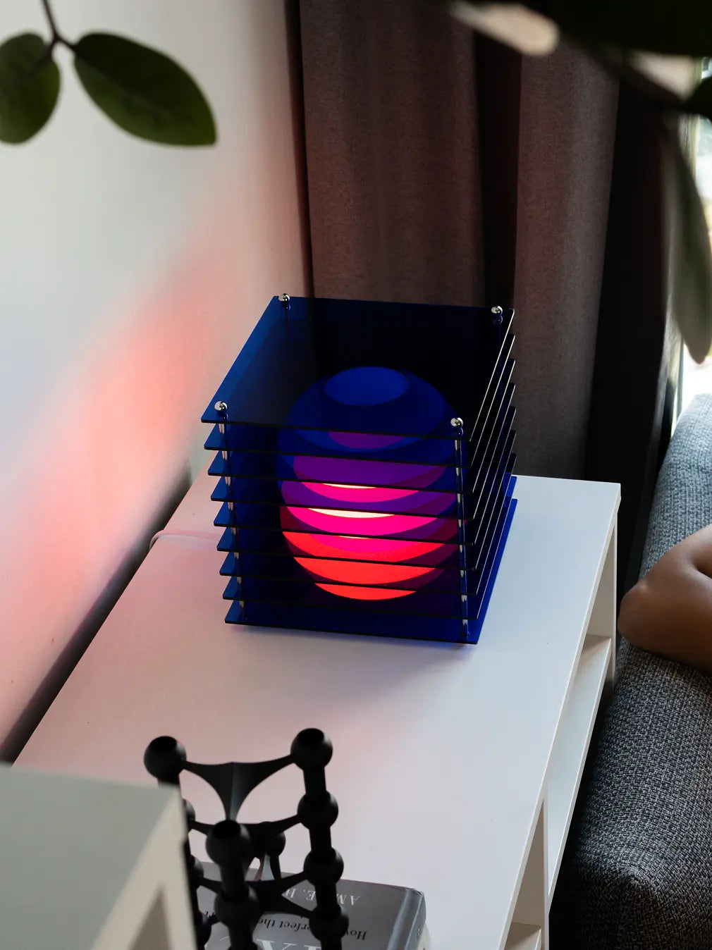 Modern ambient table lamp with soft dim pink glow for cozy bedroom decor