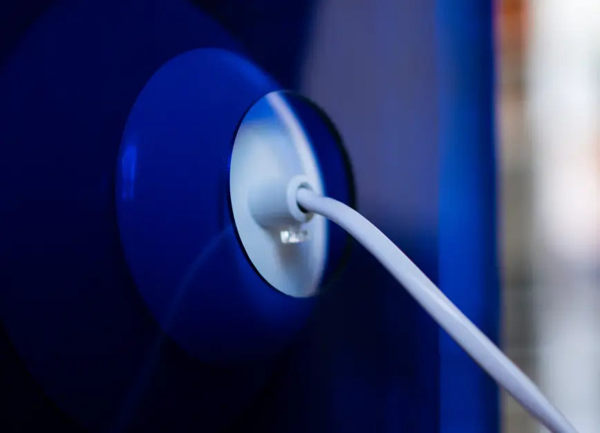 Rear cable outlet detail of Lop Blue designer table lamp with clean wire setup