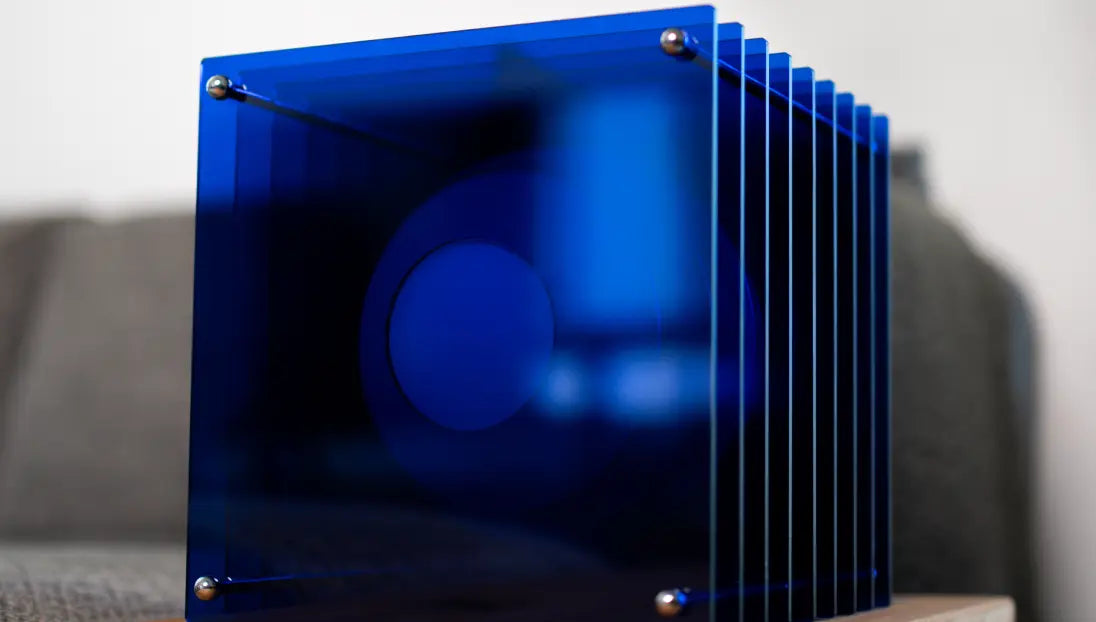 Sculptural blue acrylic table lamp for modern home decor and ambient lighting