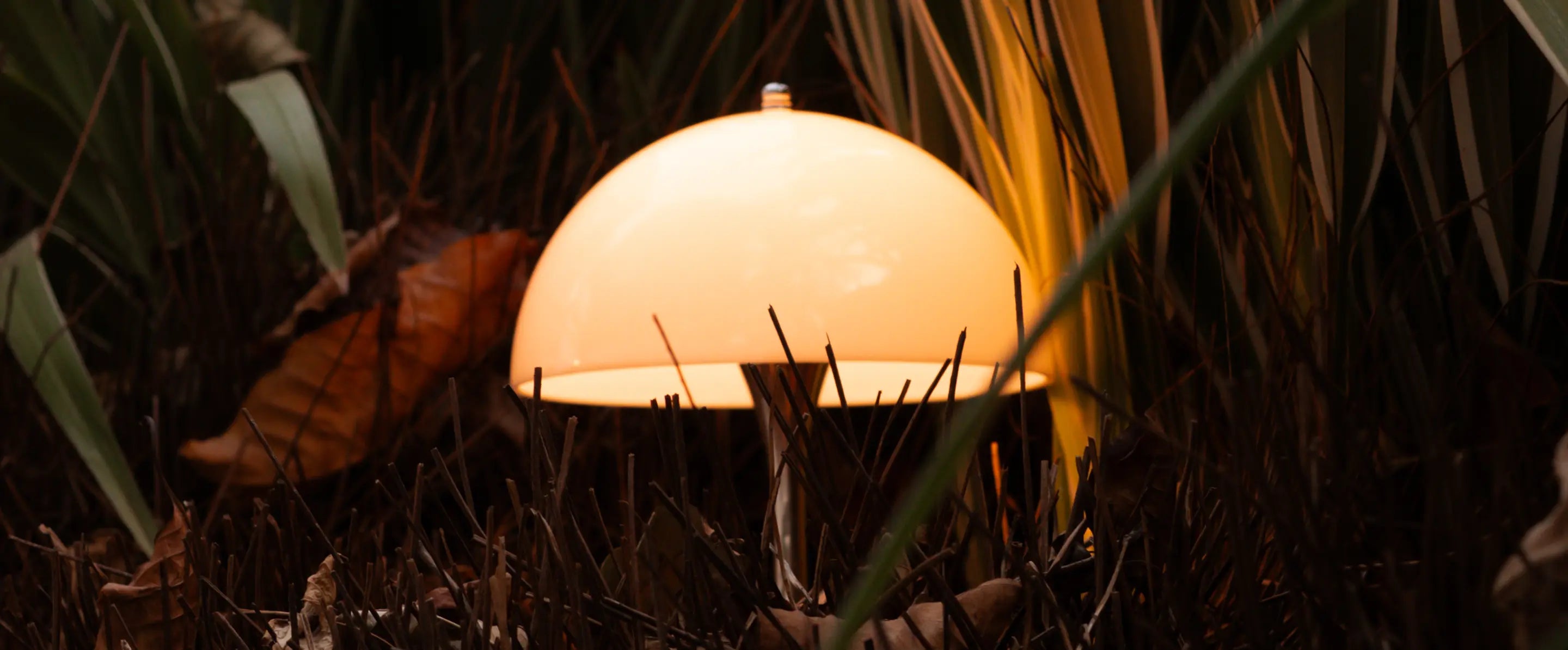 Cordless mushroom lamp with warm ambient glow for outdoor garden styling