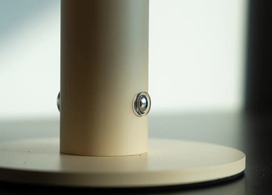 Touch control button detail of Orbit Yellow rechargeable cordless table lamp
