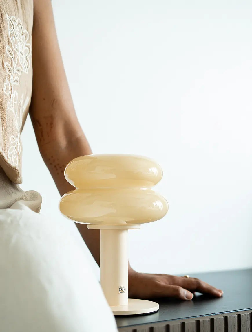 Orbit Yellow bedside table lamp with warm ambient glow and modern styling