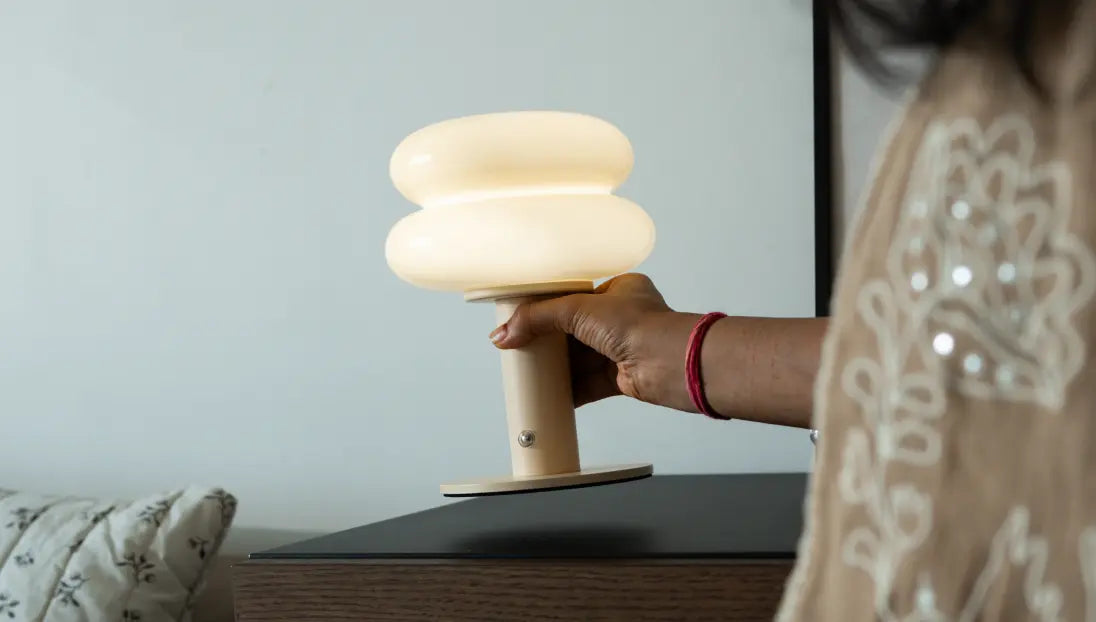 Portable rechargeable table lamp with cordless design for flexible home styling