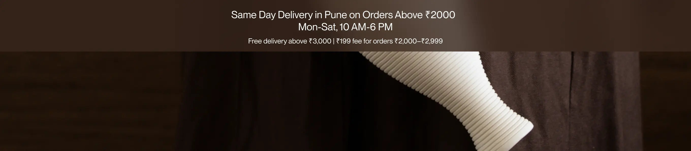 Promotional banner for same-day delivery in Pune with text and a vase in background.