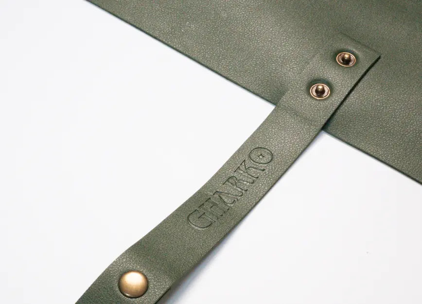 Solum Olive potting mat strap detail with textured vegan leather finish