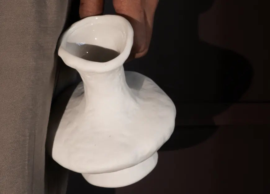 Close-up of Suki Mini Ceramic Vase showing glossy glazed interior for safe water use and fresh flowers.