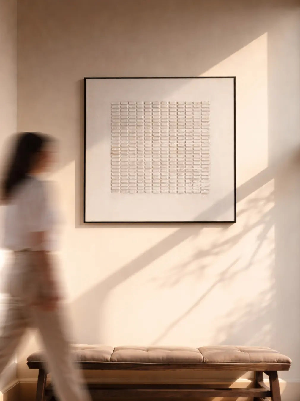Close-up of plaster texture on beige 3D wall painting showing handcrafted details