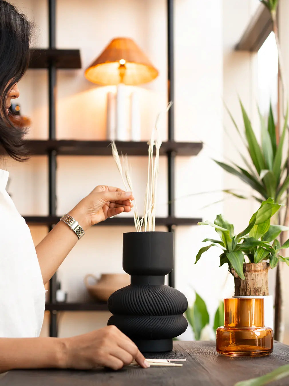 Torus Glass Vase in premium matte black glass vase styled with dry stems for modern home decor